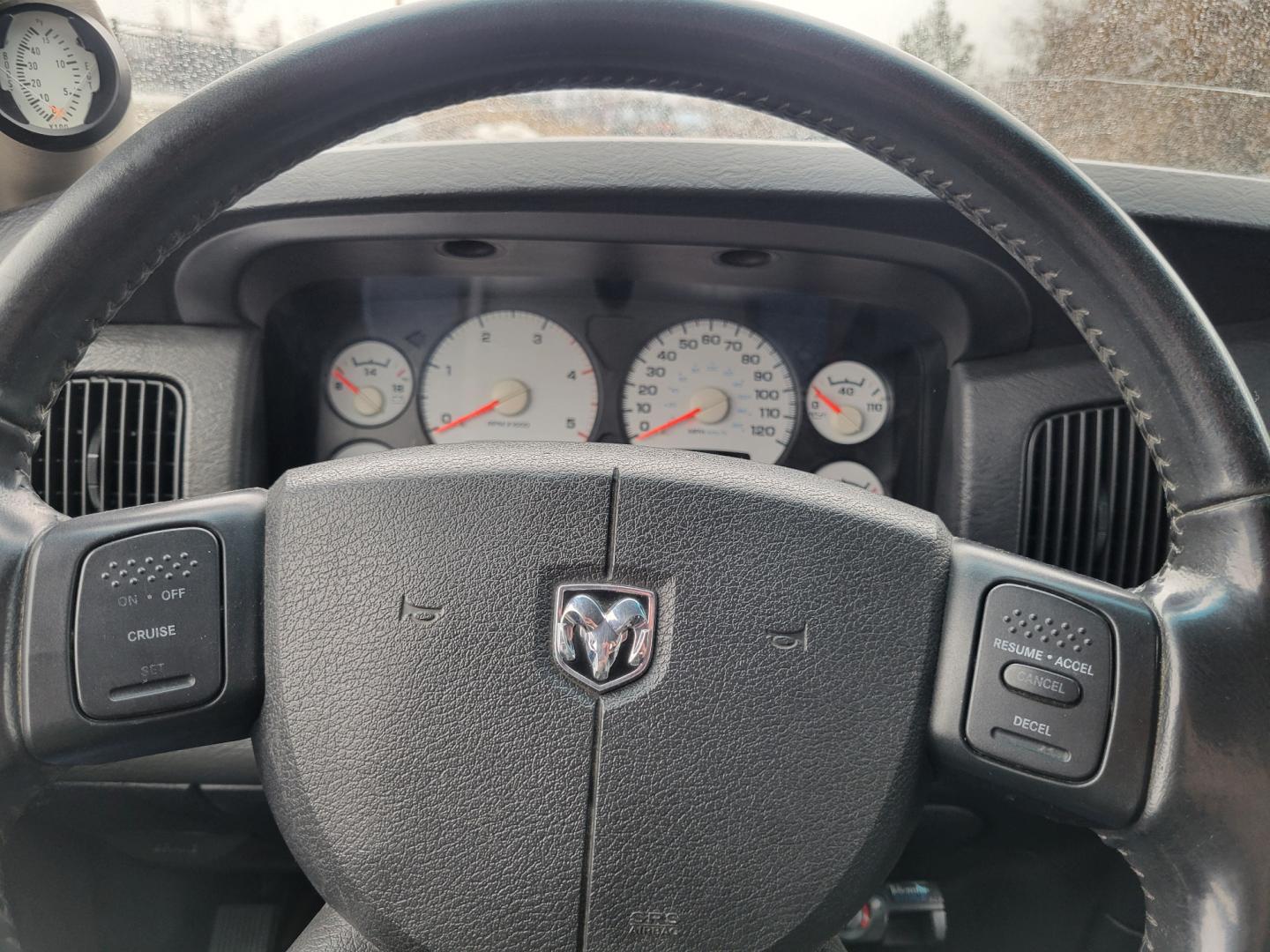 2005 White /Black Dodge Ram 3500 SLT (3D7LS38C85G) with an 5.9L I6 24V Cummins engine, 6 Speed Manual transmission, located at 450 N Russell, Missoula, MT, 59801, (406) 543-6600, 46.874496, -114.017433 - 4 Wheel Drive. One Ton Dually. Long Box. 6 Speed Manual Transmission. Has a lot of miles but runs amazingly. Air Cruise. Tilt. Power Windows and Locks. Power Drivers Seat. AM FM CD XM. 1 Owner. Clean Carfax. There is no financing options on this vehicle. - Photo#14